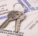 keys to house with home ownership documents
